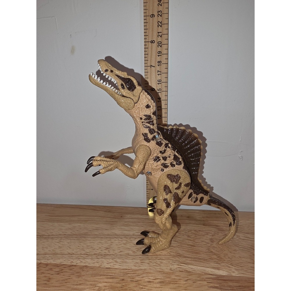 tan and brown Spinosaurus action figure appears to be a Kid Galaxy Spinosaurus